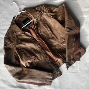 Maurice’s brown leather jacket